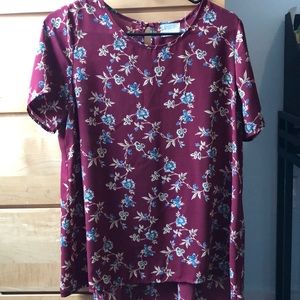 Floral pattern blouse.